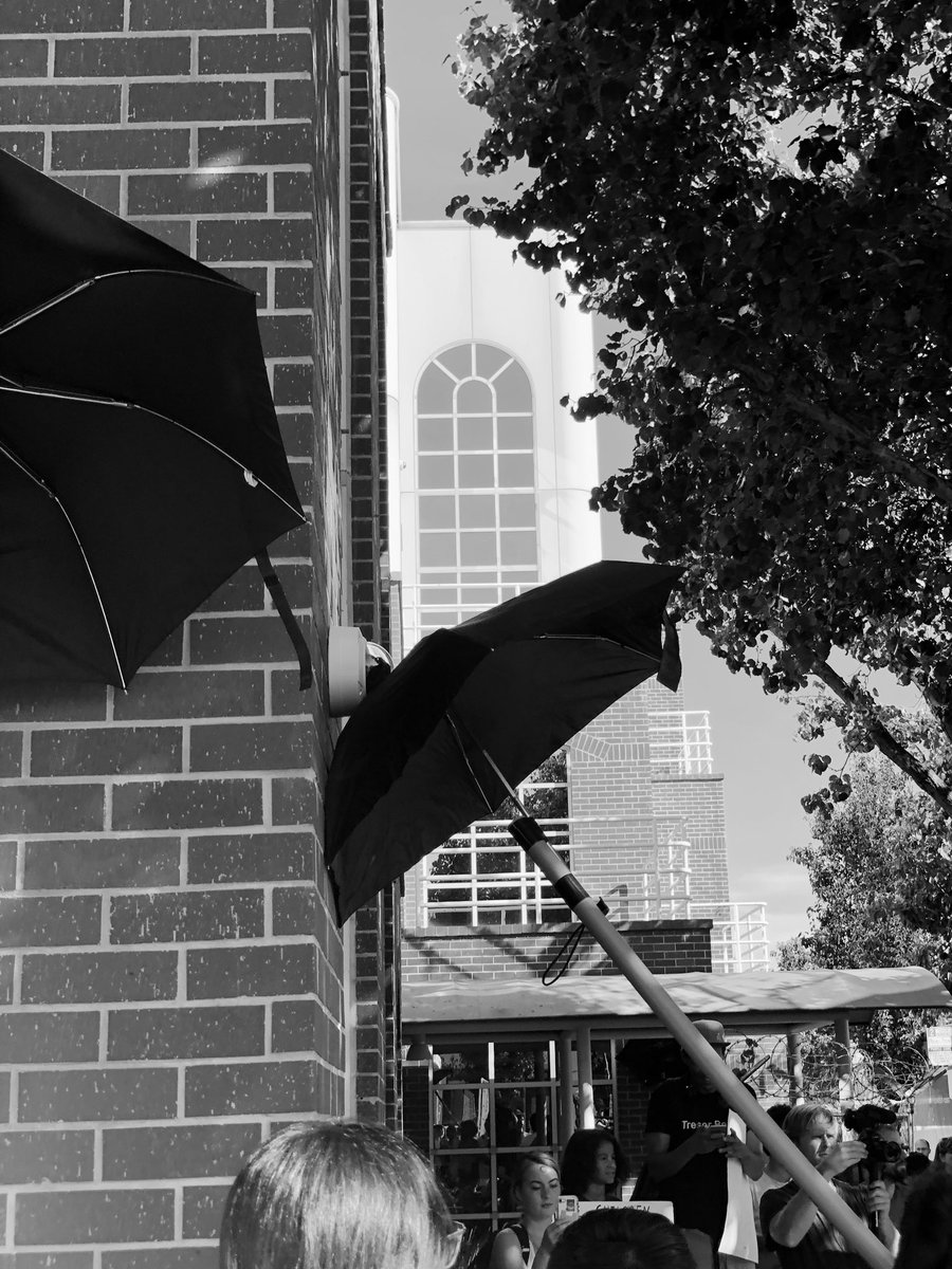 Umbrellas blocking Palantir security camera