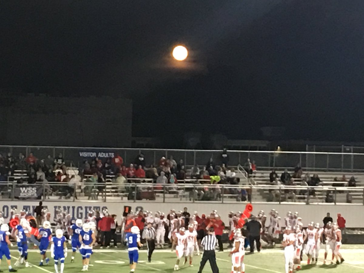 Playing Oak Creek High School football under the full moon.