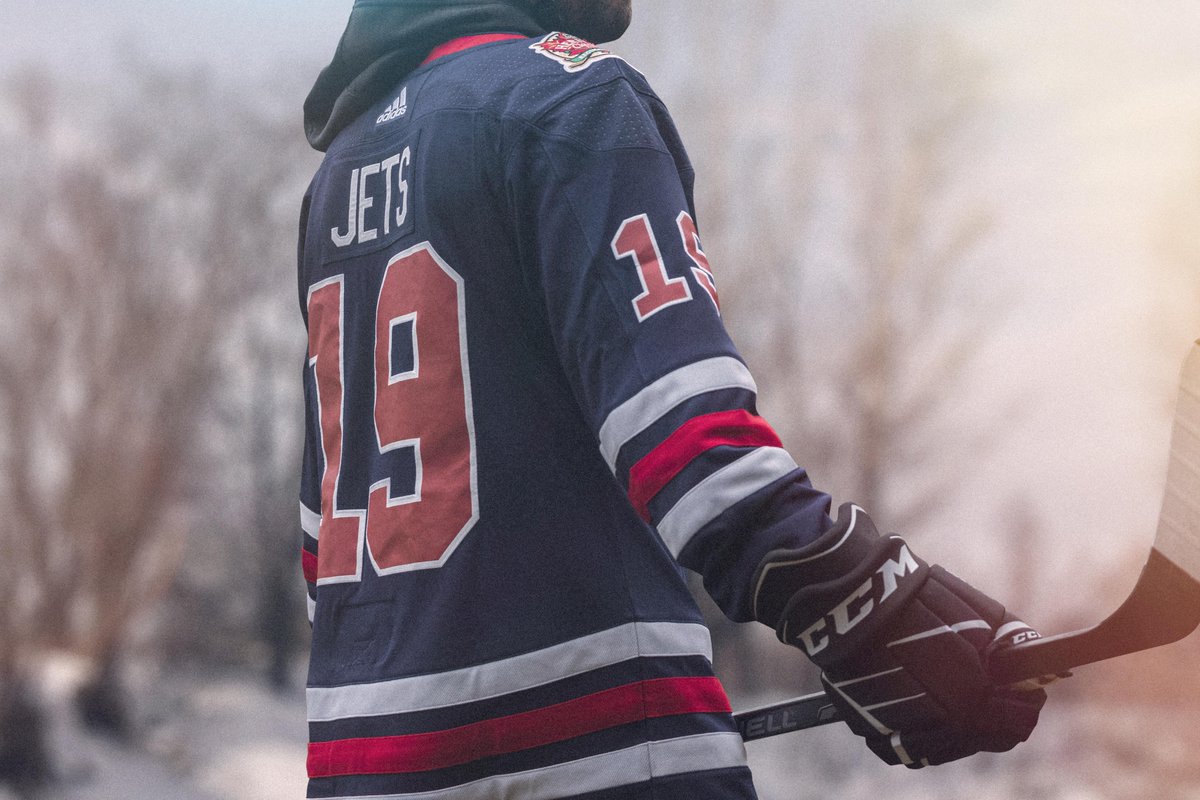 NHL's tweet photo. Prepare for takeoff! ✈️ 

The @adidashockey x @NHLJets #HeritageClassic jerseys are here. https://t.co/BGguEjdqWo