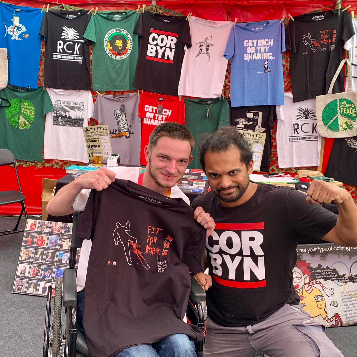 THTCCLOTHING's tweet photo. One of the best things about @TWT_NOW is catching up with old internet pals. We met @RespectIsVital last year - absolute hero indie journalist, campaigning for disability rights, anti-fascism and anti-austerity. Snapped with our #FitForWork campaign t by #VoidOne #TWT2019 https://t.co/IySe0FUkTe