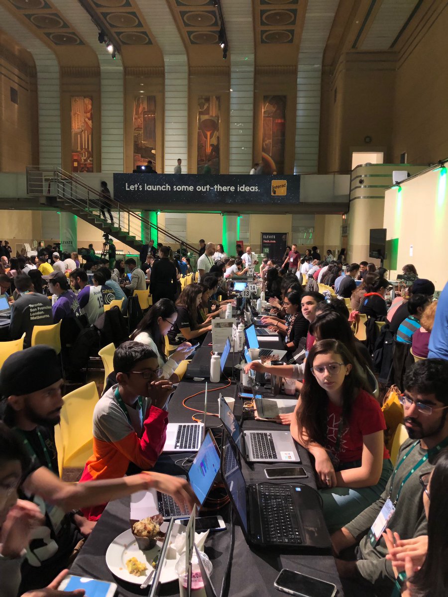 INTERAC's tweet photo. Day 2 of #ElevateTechJam is off to a great start, addressing the challenge question of #TechforGood during the full weekend #hackathon https://t.co/mp1W79MnX5