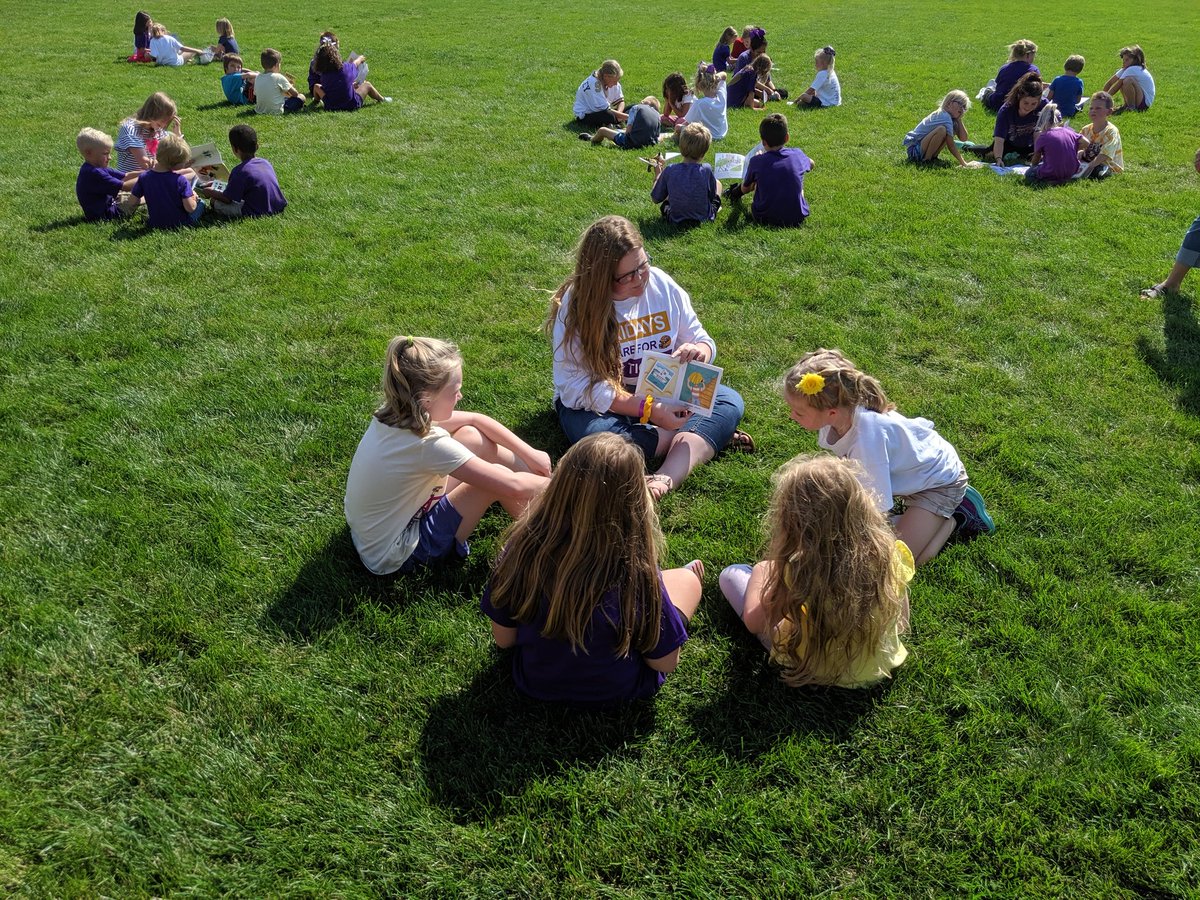 TigerMath6's tweet photo. Homecoming fun: @smstigers1 6th graders &amp; their friends from @JohnsonTigers spent time reading &amp; creating sidewalk chalk art.  6th grader high five tunnel to sent them off to their busses. @spencercsd #tigerkind https://t.co/mTvOWI66ry