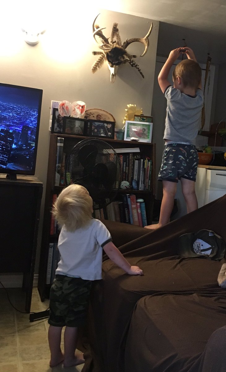 munn_douglas's tweet photo. every once in a while, i wake up before my children, enjoy the sunrise, a book, a coffee, a smoke, and ponder my existence. shortly thereafter my children are awake, throwing painted rocks around my living room, and terrorizing the otherwise tranquil morning. #gradDAD https://t.co/zXCyPC14aD