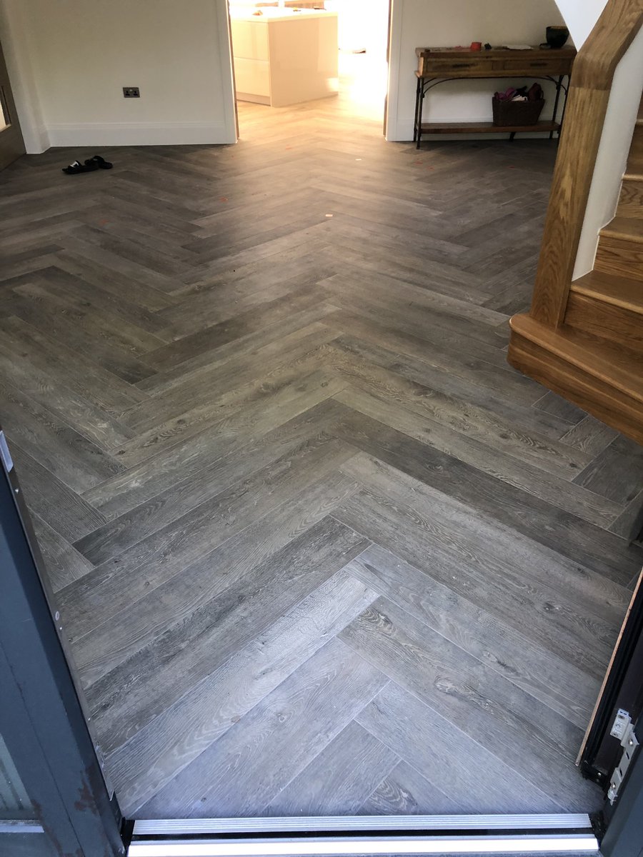 One very happy customer! 2 formats of tile in a 90 degree herringbone pattern. For our next trick the bathrooms. 
Installation materials <a href="/KerakollUK/">Kerakoll UK</a>  <a href="/kerakoll_ES/">Kerakoll ES</a> Long way to go yet.  Tiles supplied by <a href="/CTC_Tiles/">CTC Team</a> <a href="/belindaopenshaw/">Belinda Peters</a> <a href="/tilers_tools/">Tilers Tools</a>