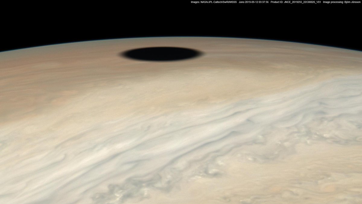 Björn Jónsson (@bjorn_jons) on Twitter photo Io's shadow from <a href="/NASAJuno/">NASA's Juno Mission</a> image PJ22_26 obtained on September 12, 2019. This is an approximately true color/contrast image. Jupiter's bluish sky is faintly visible at the limb. Io's shadow from <a href="/NASAJuno/">NASA's Juno Mission</a> image PJ22_26 obtained on September 12, 2019. This is an approximately true color/contrast image. Jupiter's bluish sky is faintly visible at the limb.