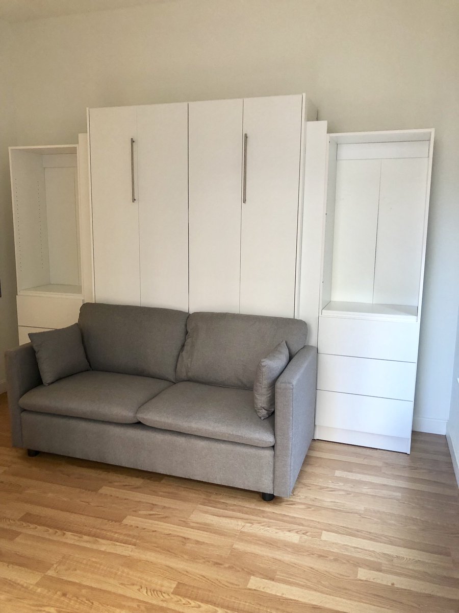 MurphybedsBroR1's tweet photo. Millie’s studio in Brooklyn got a major upgrade thanks to a full size Murphy sofa! Two side cabinets with drawers on the bottom and shelves on the top will give some much needed extra storage space! #Murphysofa #studio #Instantbedroom #studionecessities #nobodydoesitbetter https://t.co/VAPPSX8PaQ