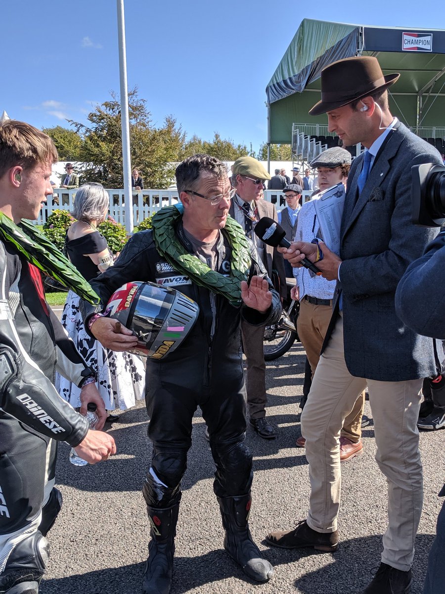 DavidaHelmets's tweet photo. #davidahelmets bursting with pride here @goodwoodrevival. Koura Racers on the podium @SamClews takes 2nd with Hickman & Glen English 3rd with Molner #GoodwoodRevival. First in modern times for a helmet made in england #davidauk #nortonmanx https://t.co/pJPicQqM52