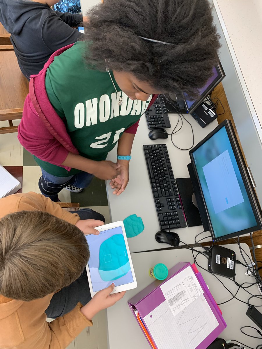 missbyrneSTEM's tweet photo. Some pictures of my students working hard, brainstorming and collaborating during our first of many #newtechFridays as they use a variety of props as a #greenscreen to complete the #WormholeChallenge! #stem #edtech #AppleEDUchat #everyonecancreate #MSstem https://t.co/Kxniwhd6fx