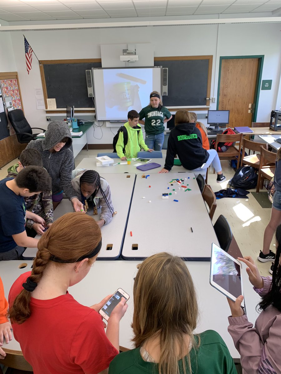 missbyrneSTEM's tweet photo. Some pictures of my students working hard, brainstorming and collaborating during our first of many #newtechFridays as they use a variety of props as a #greenscreen to complete the #WormholeChallenge! #stem #edtech #AppleEDUchat #everyonecancreate #MSstem https://t.co/Kxniwhd6fx