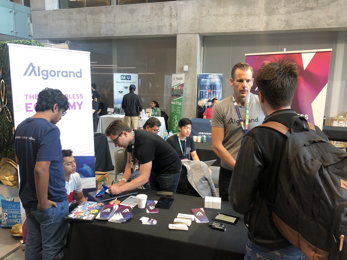 Algorand's tweet photo. Hour 14 of mentoring hackers! Already 7 teams building on Algorand! #borderlessdevelopment @HackTheNorth https://t.co/Q5gABYvskQ