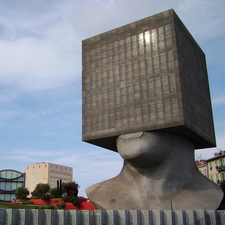 There’s always been a surreal thread running through some practitioners work, this is the Tête Carrée, Nice, France, 1997-2002 Sculptor Sacha Sosno and Architect Yves Bayard. The 14m by 14m cube contains the offices of the Municipal Library of Nice.Image unknown source