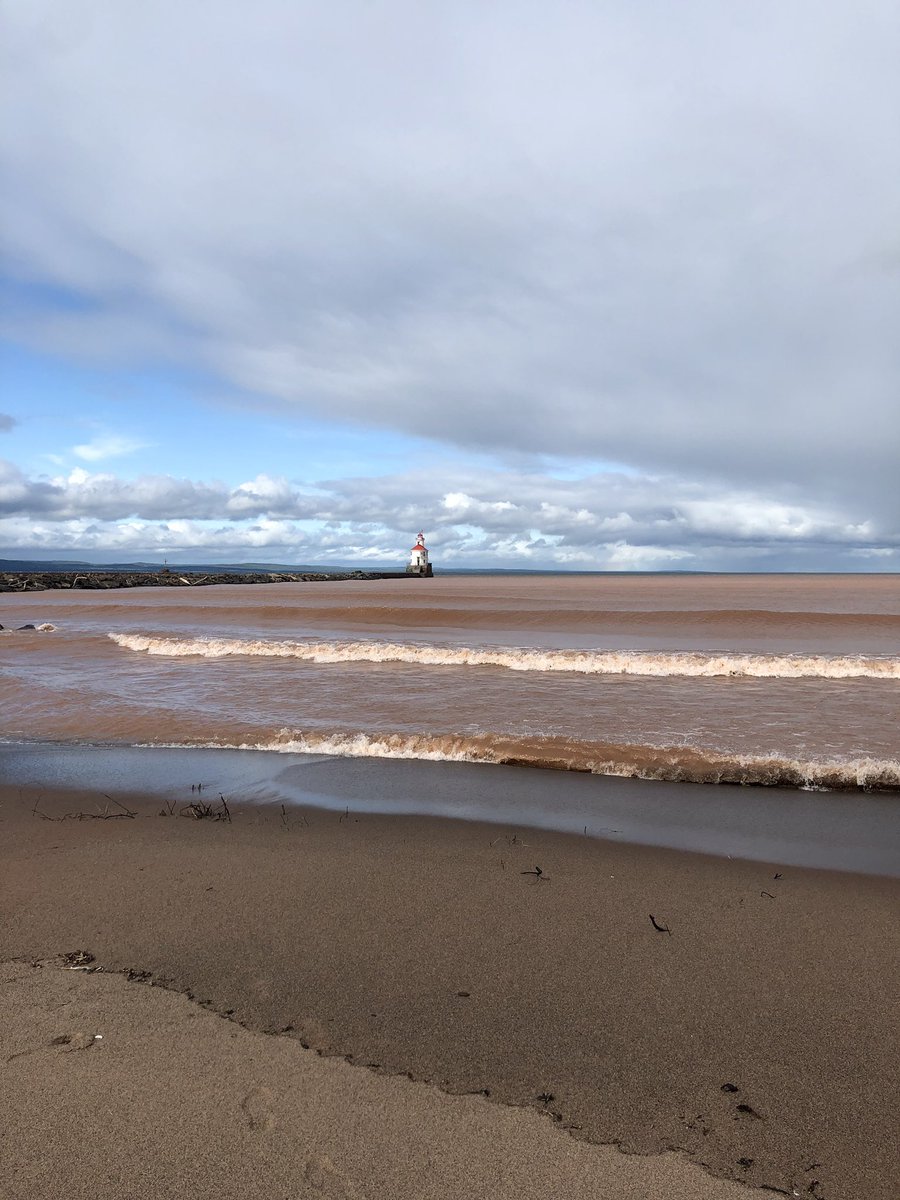 NicoledeB's tweet photo. The clay earth of northwestern Wisconsin drained into Lake Superior creating pink water - adventures w/#daisycam #wisconsinpoint https://t.co/gB0WjbITIV