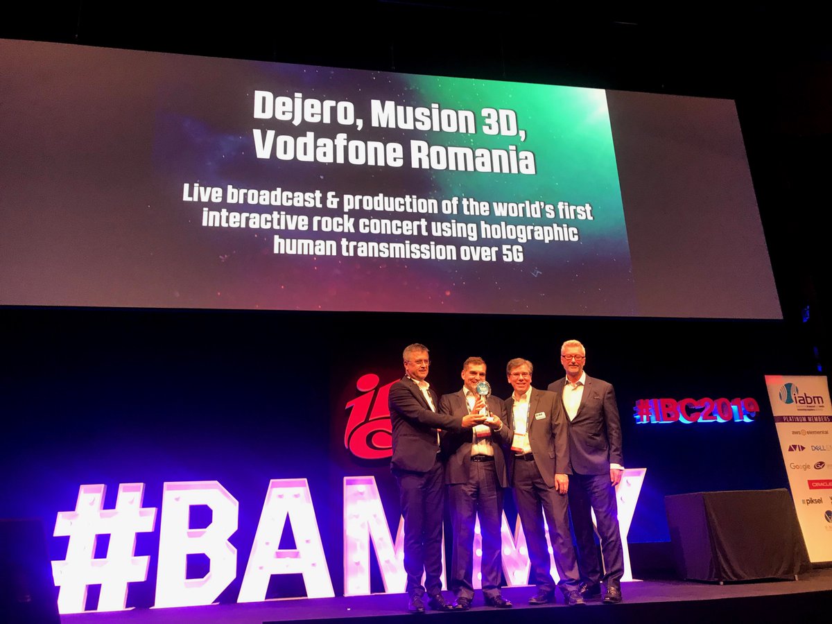 DejeroLabs's tweet photo. WE WON! A collective effort, we are so pleased to announce we wont the #BaMmy for the 'Live broadcast &amp; production of the world's first interactive rock concert using holographic human transmission over 5G' project along with Musion 3D and Vodafone Romania! 🙌 https://t.co/fjHQYYpL2J