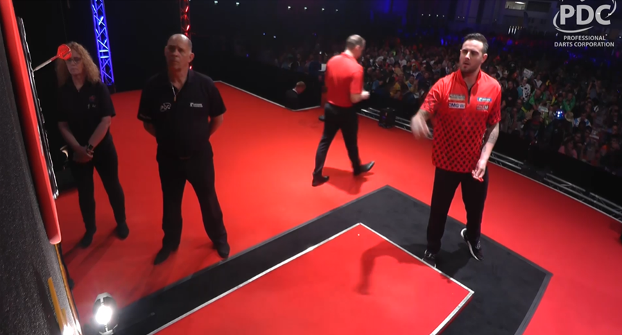 livedarts's tweet photo. Joe Cullen has been given special dispensation to wear trainers and is using a shirt and darts from the merchandise stand after his luggage was lost in transit! 😬 #IDO19 https://t.co/NQd09uJXHL
