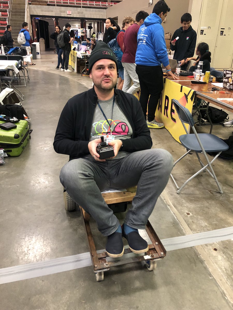 johncohnvt's tweet image. Hendrik writing the “indoor Tesla“ at #hackmit #mitibm