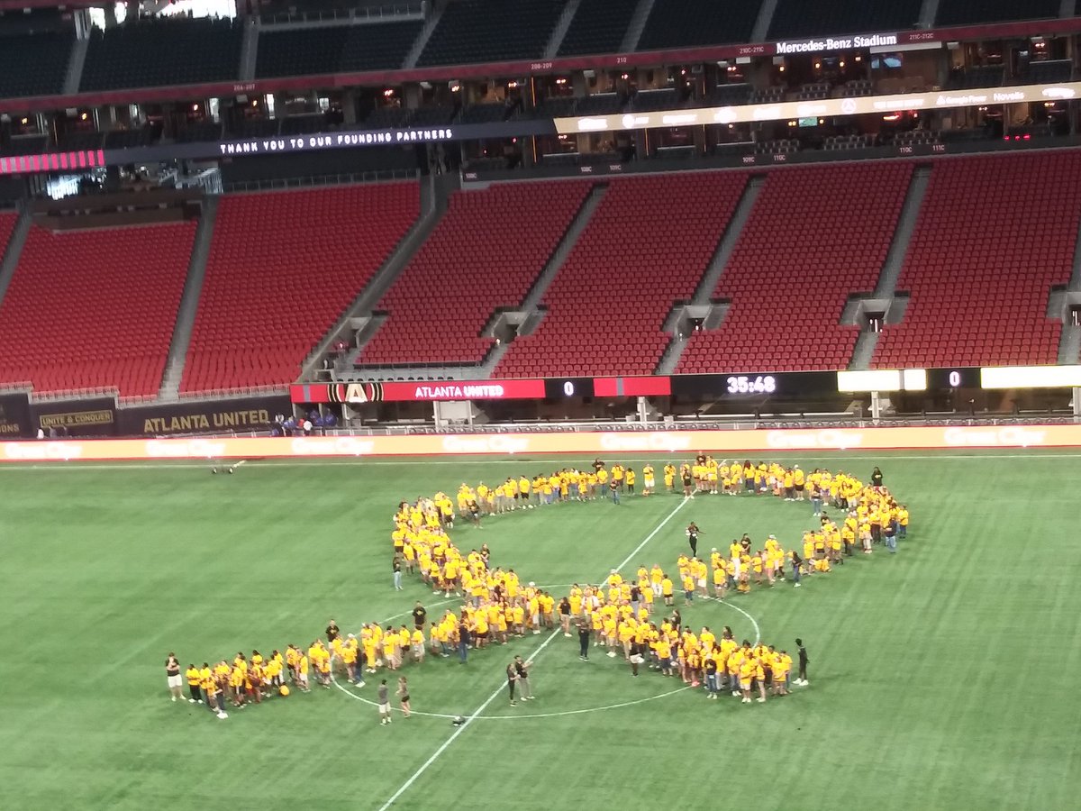 Kenyam34's tweet photo. @MBStadium @ATLUTD @MBSTeamMembers welcome to our home field with Landon and his dad Tom. Let's get a big win #ATLD for #ChildhoodCancerAwareness https://t.co/E904p8Oxt0