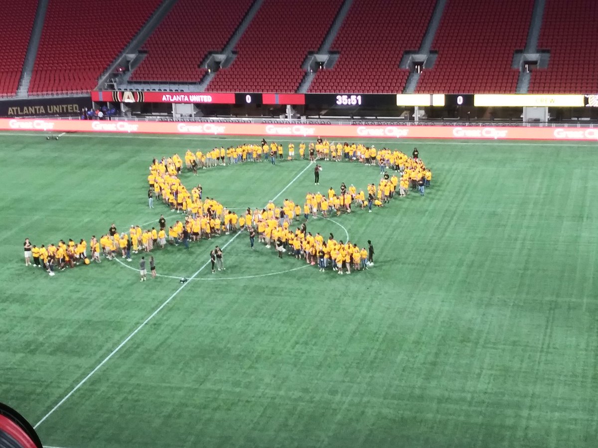 Kenyam34's tweet photo. @MBStadium @ATLUTD @MBSTeamMembers welcome to our home field with Landon and his dad Tom. Let's get a big win #ATLD for #ChildhoodCancerAwareness https://t.co/E904p8Oxt0