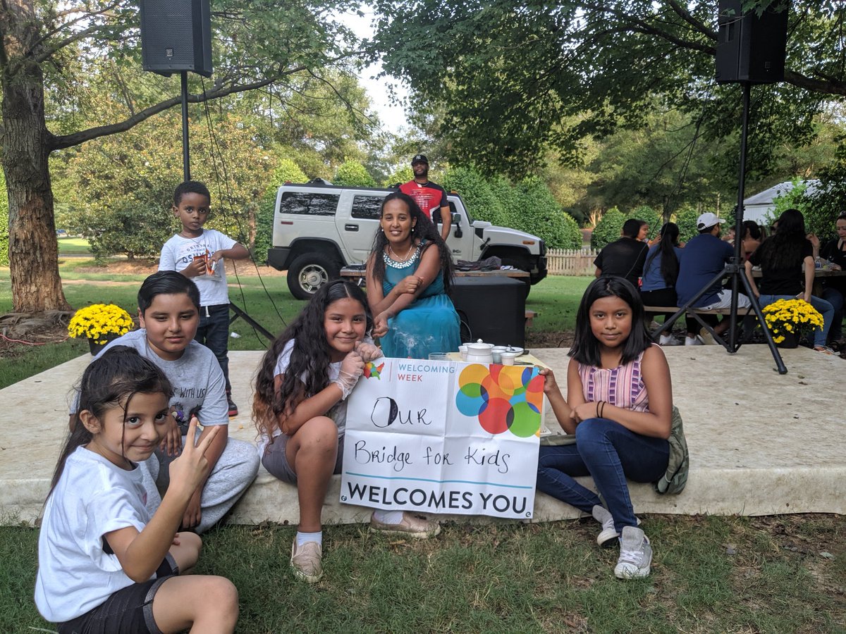 Charlotte_Intl's tweet photo. Celebrating #WelcomingWeek  with @ourBRIDGEkids having a blast dancing and eating and enjoying a dozen different cultures! https://t.co/Zc6X0e9t6N
