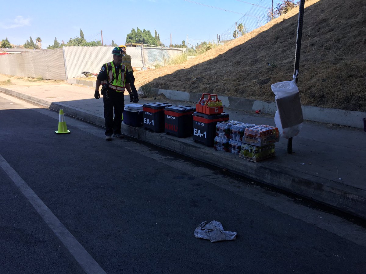CertLAFD's tweet photo. #LAFD #CERT Team 83 (#CE83) is on scene to provide Hydration for Firefighters in the High Heat 🥵 as they 🧯hot spots. https://t.co/0wEQ86M51d