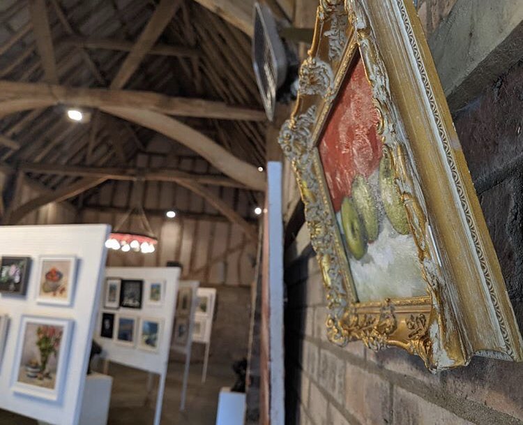 mooncatcher88's tweet photo. I’ve got some paintings available at The High Roding Art Exhibtion this week. What an amazing space to have work displayed in! 
#artexhibition #stilllife #art https://t.co/ZOvdY22Buf