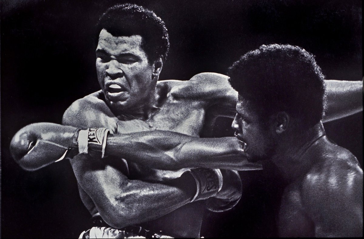 mohistorymuseum's tweet photo. @stltoday photographer J.B. Forbes snapped this shot of #MuhammadAli's rematch against #STL boxer Leon Spinks. The match took place #OnThisDay in 1978 and resulted in Ali becoming the first man to win the World Heavyweight Championship three times. #InFocusSTL https://t.co/oVAqcDhDLt