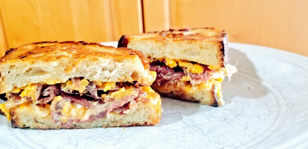 brewyah's tweet photo. Was worried I was flying too close to the sun with everything on this mutant Reuben - beer mustard, cheese, elk pastrami, two types of sauerkraut, banana peppers, more cheese, and mayo, on #sourdough - but it turned out sweet. @Tfromyyc https://t.co/dYks47PUFf https://t.co/J2HF4KBVgb