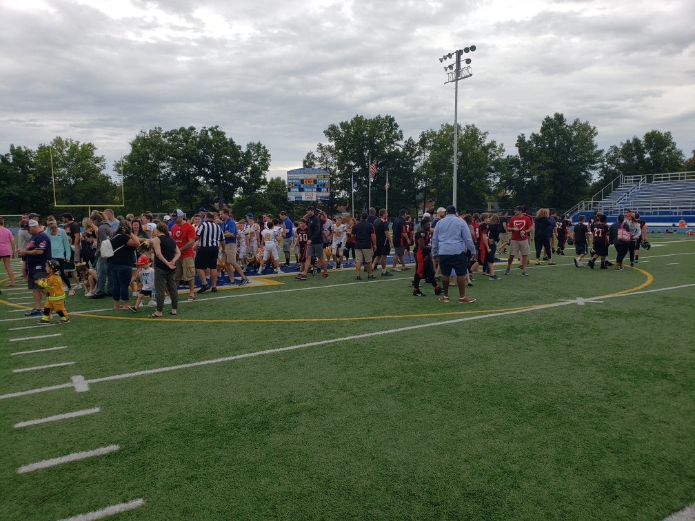 CYOSportsDOC's tweet photo. @SColumbkilleCLE cheer leaders ended their halftime performance by saying "Thank you parents". Parents joined their athletes on the field after the game for prayer. https://t.co/qKSnfj5TfH