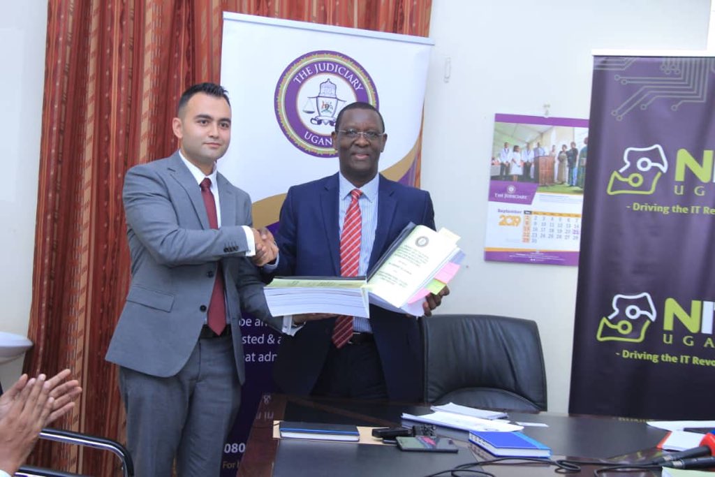 JudiciaryUG's tweet image. This morning the Judiciary has signed the contract for the Design, Development and Maintenance  of the Court Case Management Information System ECMIS.