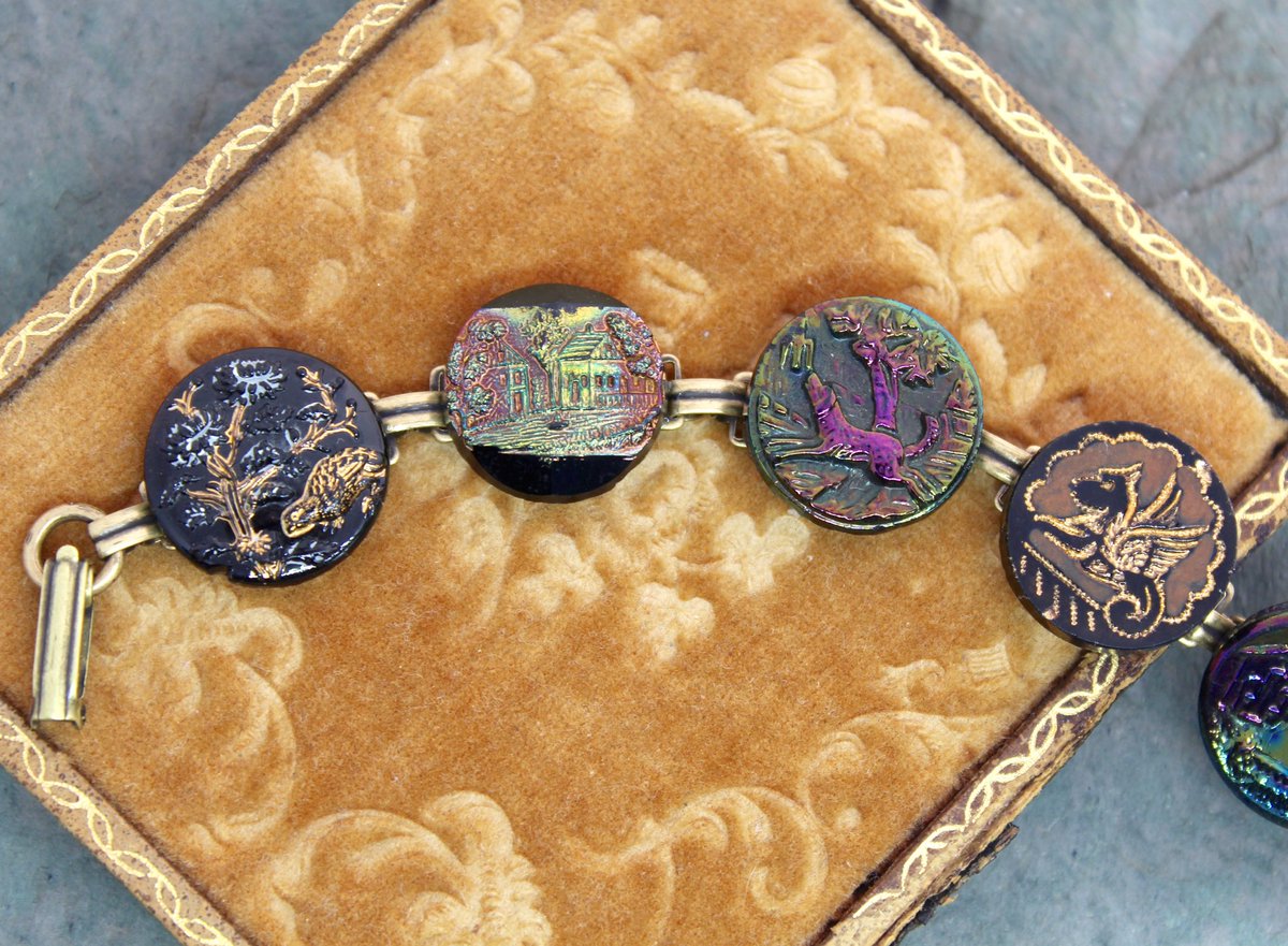 lbergeron74's tweet photo. Stunning black glass antique picture buttons with rainbow luster.  https://t.co/InRaVU1K47 https://t.co/ZML6qDg98C