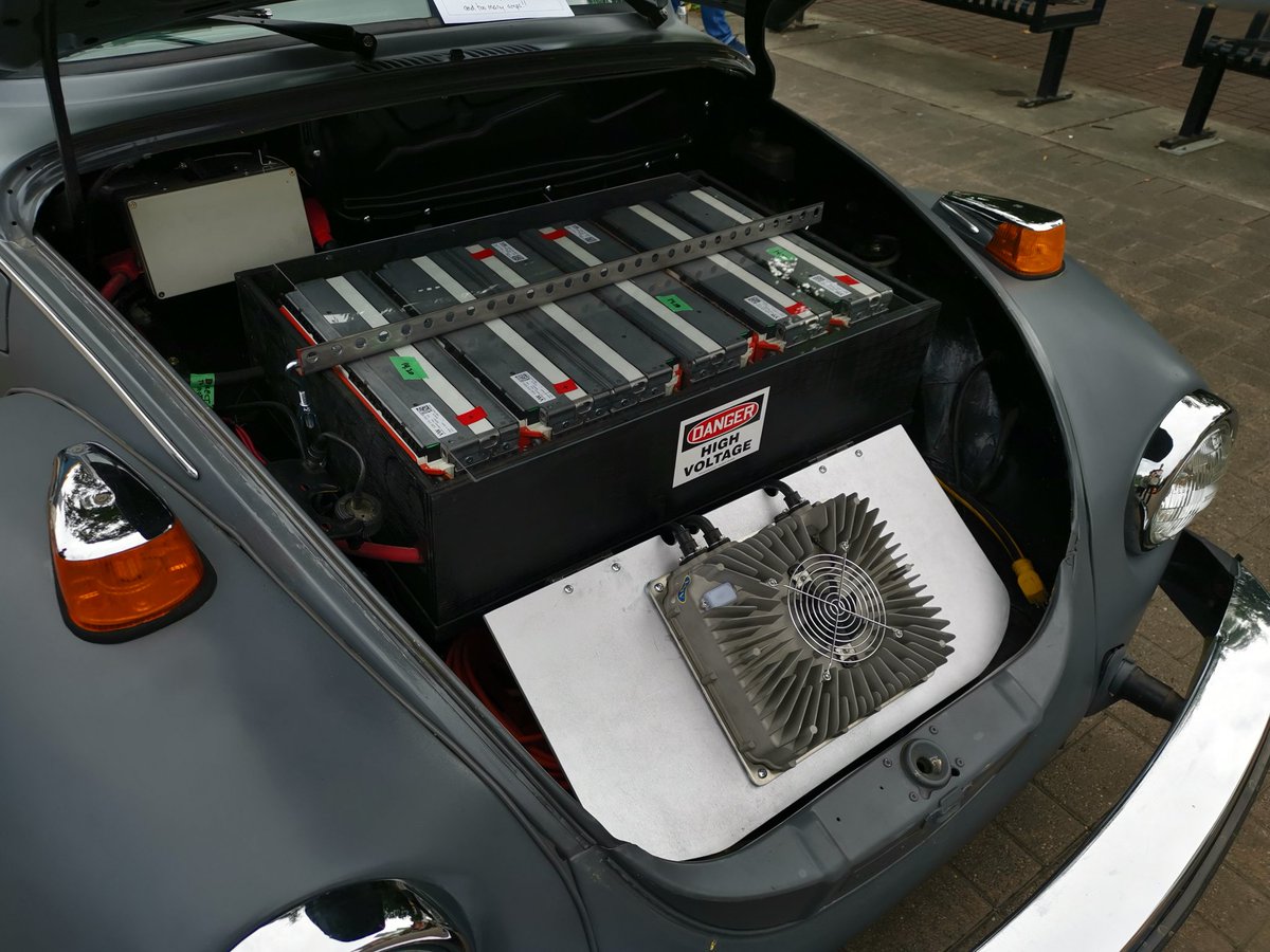 PlanetWarren's tweet photo. Behold, the Volts-Wagon. #evcarshow #yyc @kinsellawarren https://t.co/ndZVSi5zPM