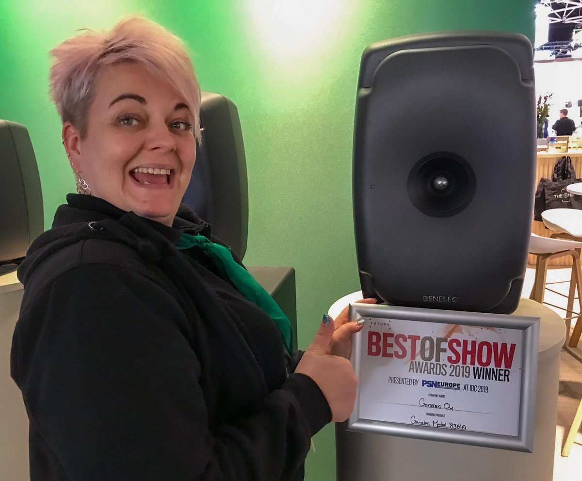 Genelec's tweet photo. Genelec’s wonderful Event Marketing Co-ordinator Anne Martikainen shows off our IBC Best of Show Award, presented to us by @PSNEurope in recognition of the new 8361A coaxial studio monitor. Thank you, we’re truly grateful! https://t.co/NAfboahbMt @IBCShow #GenelecTheOnes https://t.co/94NkiyFvVc