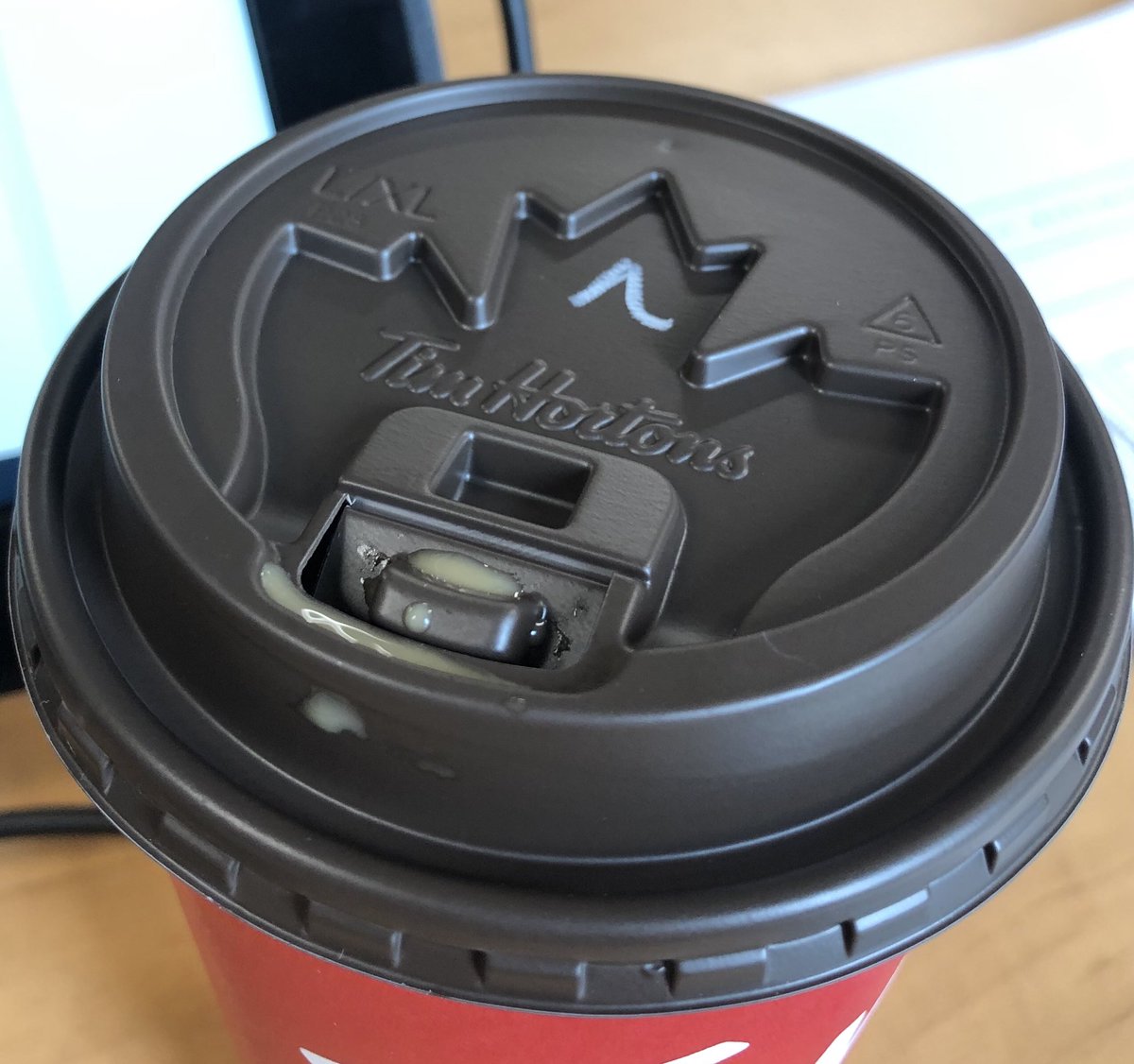 Hey <a href="/TimHortons/">Tim Hortons</a> Just letting you know most people hate your new lids, seems like more plastic than old ones and the coffee flow is awkward and drips.  Maple leaf is a new a nice touch although 👌🇨🇦