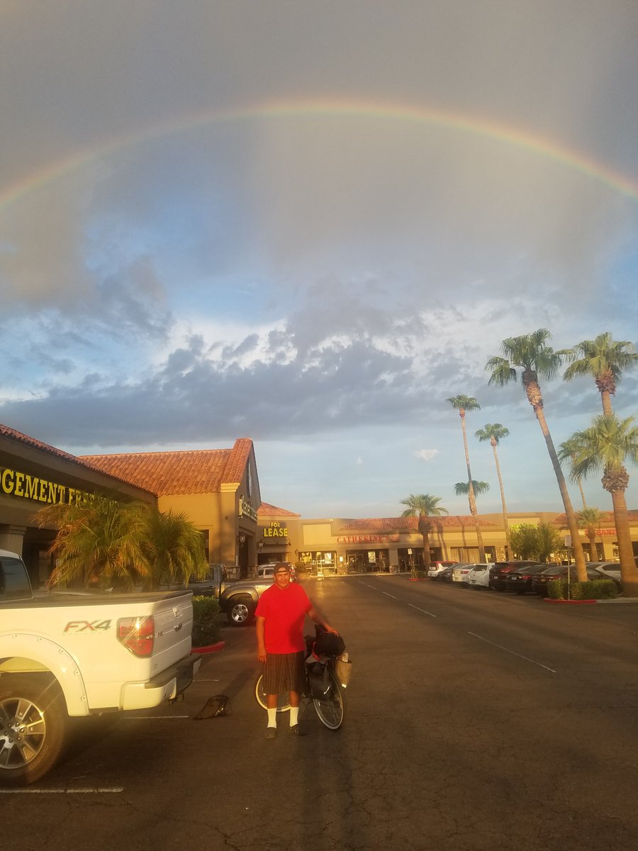 MinistriesLa's tweet photo. Homeless and now standing outside of the facility were Arthur will now be able to shower every day he stood under the rainbow of God's promise.  Then as it began to rain Arthur was reminded of Luke 25:10 of the angel's tears of joy for him and his repentance.  God is so Good. https://t.co/cGME2vFkRS