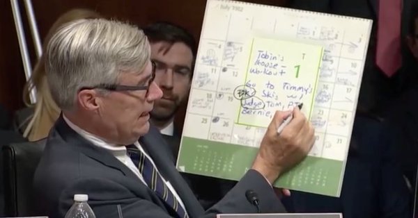parody_musk679's tweet image. Here's Senator Whitehouse holding up a blow-up from Kavanaugh's high school calendar, pretending to believe that it might be "powerful corroborating evidence" 🙄that Kav sexually assaulted Ford. They didn't care if whether it was true, and they still don't. #KavanaughSmear