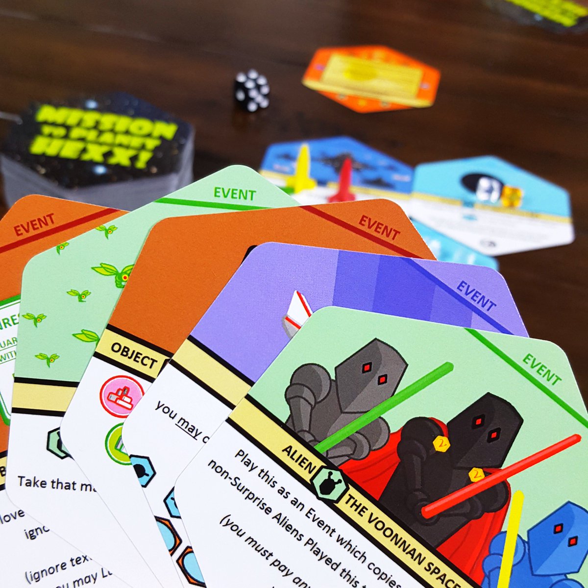 WCGamesMN's tweet photo. Mission to Planet Hexx!: https://t.co/n3htbEAiVf Fun hex card game where you build a galaxy, try to screw other players and finish off your mission file first. Up to 3 actions per turn (can do multiples) and watch game turn on dime. Fun to play! @FunchoMcLaLa #whitecabinetgames https://t.co/XGMrYyg7Cv