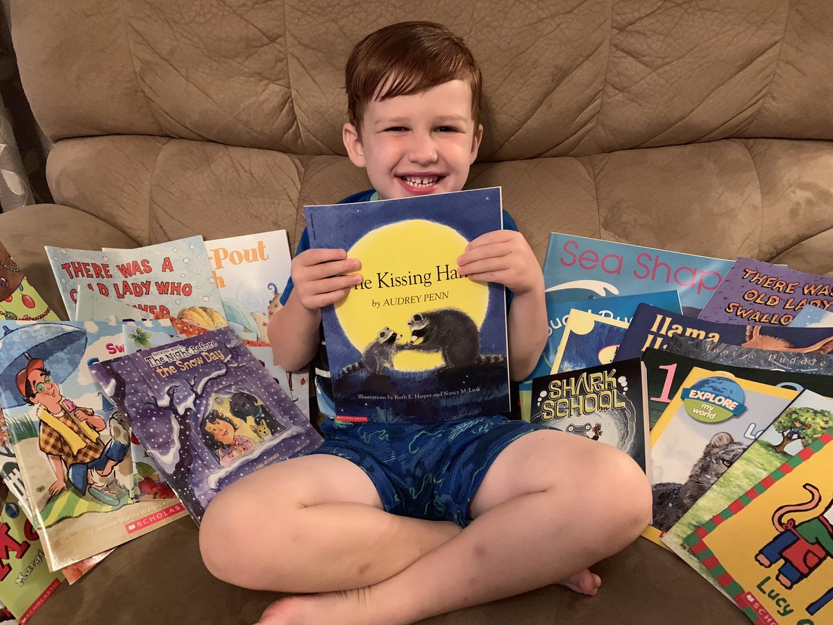 50 new books! One happy little reader!  Thanks <a href="/wcpsmd/">WCPS Maryland</a>!!!