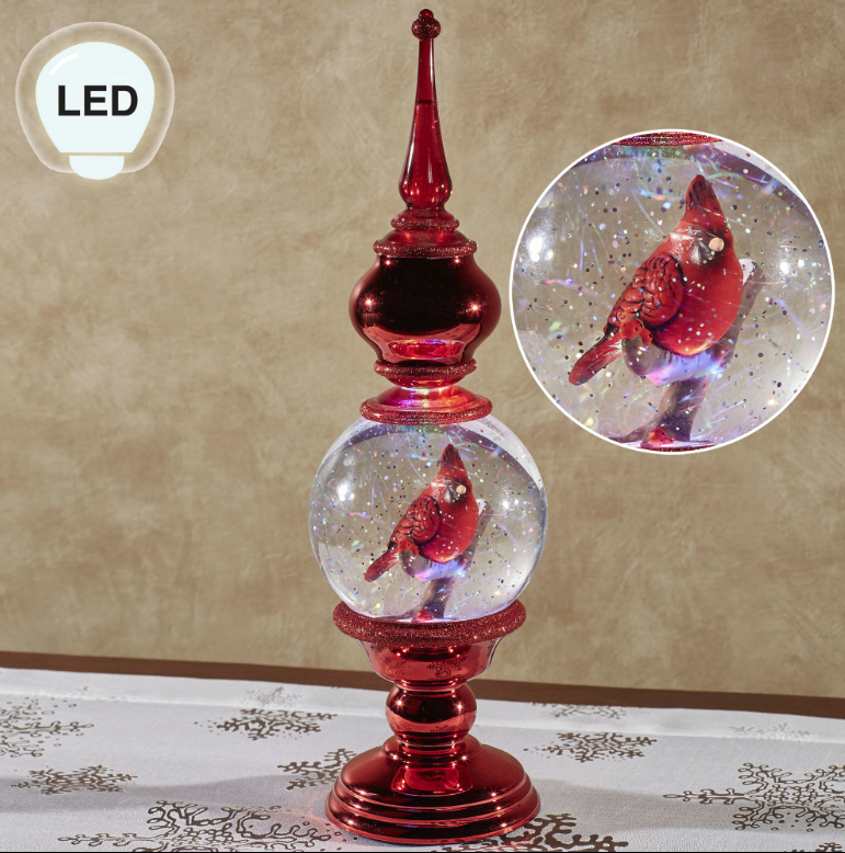 elliexiaoo's tweet photo. The Shimmer Cardinal LED Lighted Finial displays a glimpse of winter magic. Crafted from acrylic, the unique accent features a shaped red design detailed with sparkling red glitter. The center clear ball accent houses a charming cardinal perched on a snowy branch with berries. https://t.co/v4Q53AhCdt