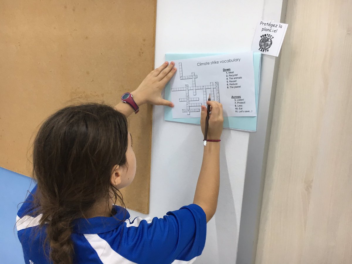 S107MFL's tweet photo. Students in Years 5 and 6 French are doing a treasure hunt for new vocabulary about the environment in preparation for the #schoolstrike4climate on Friday. Look out for our French placards! @StAndrews_107 #cognitaway https://t.co/zfycBxC5dT