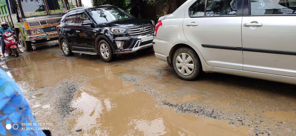 AjitKabadi's tweet photo. @bbmpcommr @BBMP_MAYOR @carmelaramunite @chairmanbwssb AET Junction after couple minutes of yesterday rain , on IT corridor, we need road not water stream @publictvnews @tv9kannada @ArvindLBJP https://t.co/lsq1wWixYT