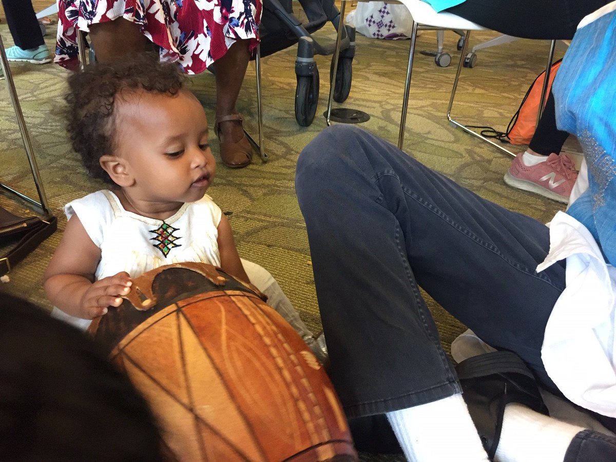 MCPL_Libraries's tweet photo. A young customer in traditional Ethiopian dress, explores a drum at #SilverSpringLibrary's Ethiopian New Year’s Celebration and Coffee Ceremony. Thank you Ethiopian Literary and Cultural Awareness Association for sponsoring this event. https://t.co/EOhXBuHK7b