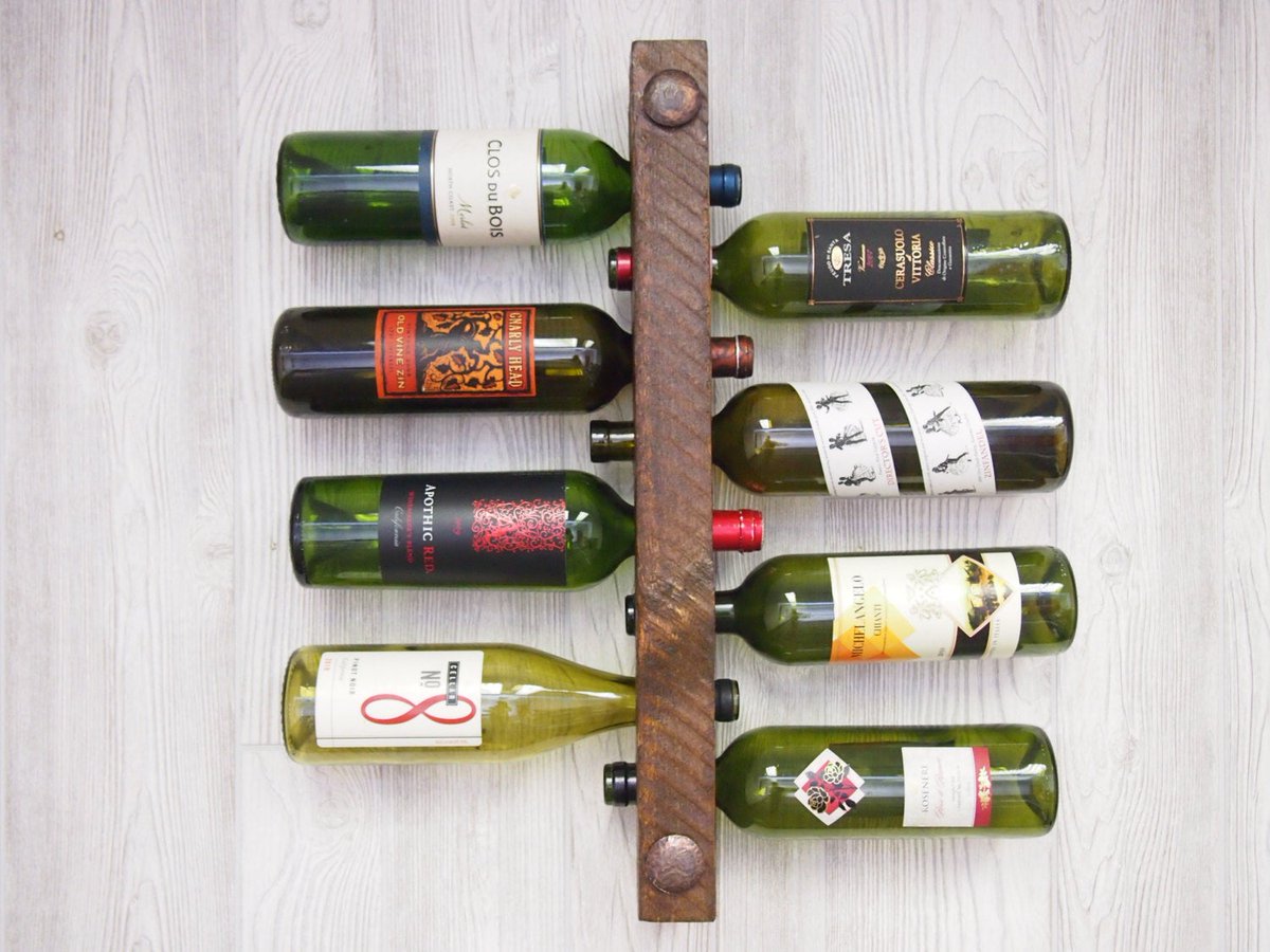 Really love this, from the Etsy shop HewnAndForged. etsy.me/305wIrv #etsy #housewares #uniqueweddinggift #coolweddinggift #wallwinerack #uniquegiftideas #rusticwinerack #winedecor #winerack #winestorage