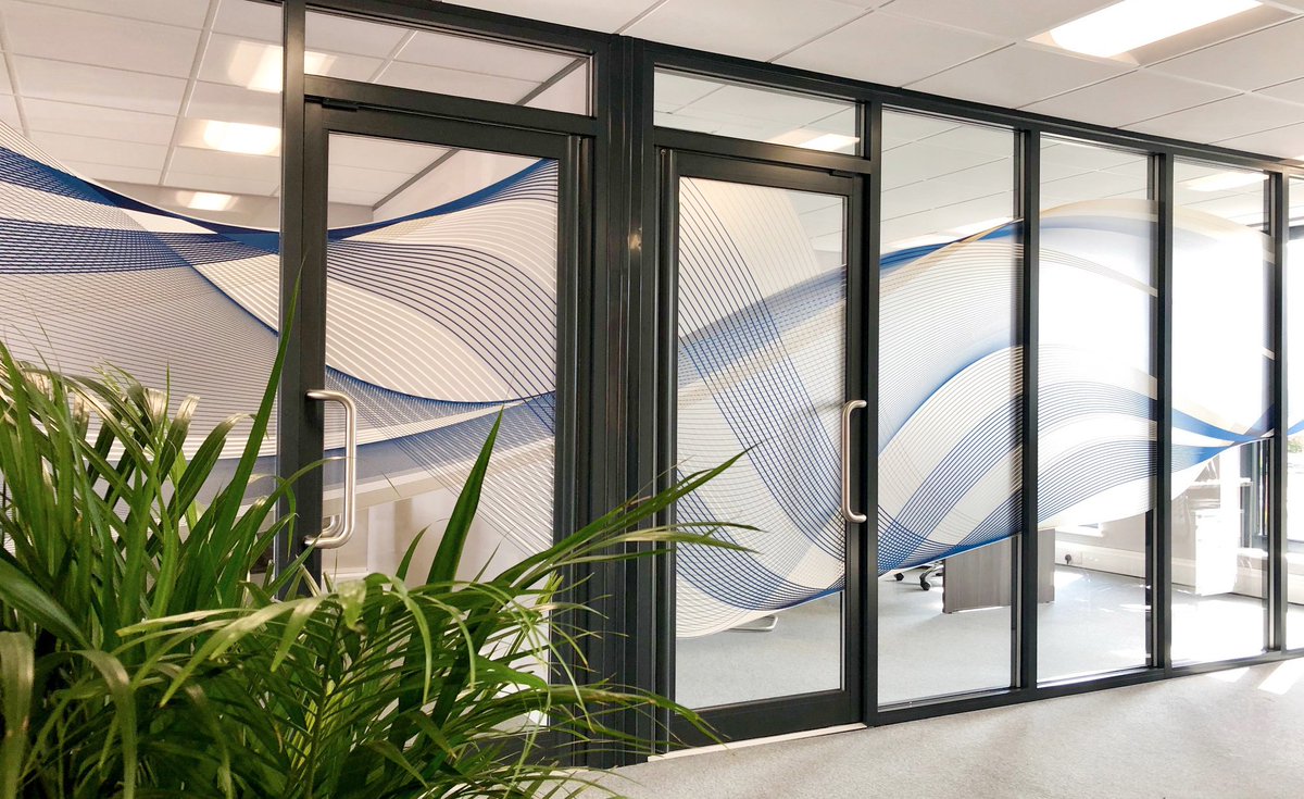 Bespoke printed window film, designed by us in-house, for Nine Oaks Financial Management's fabulous new office space.