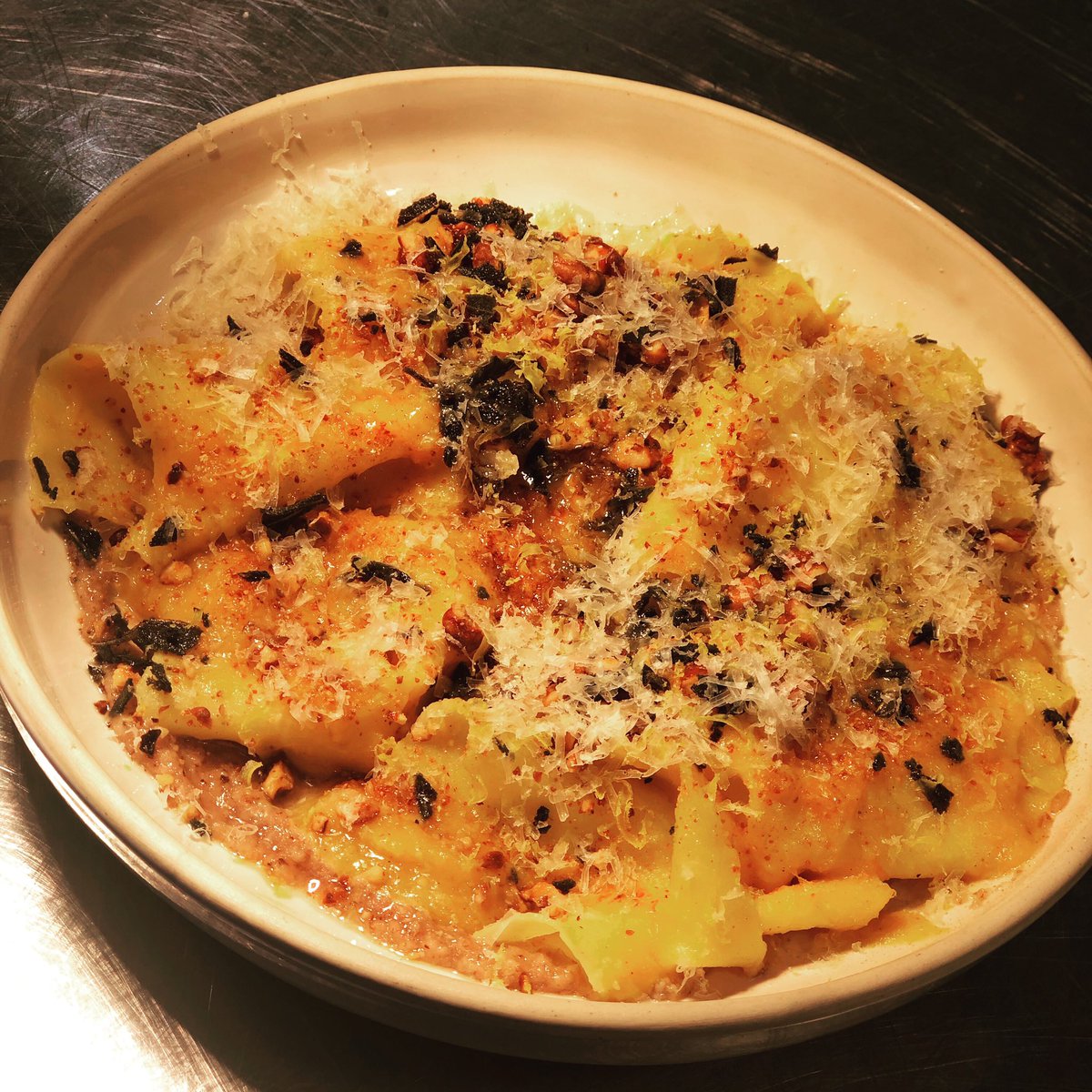 Nom nom! New autumn pasta dish on the menu this week at Oliveto! Homemade handkerchief pasta, walnuts, garlic, squash and sage. Food for the soul. #italianfood