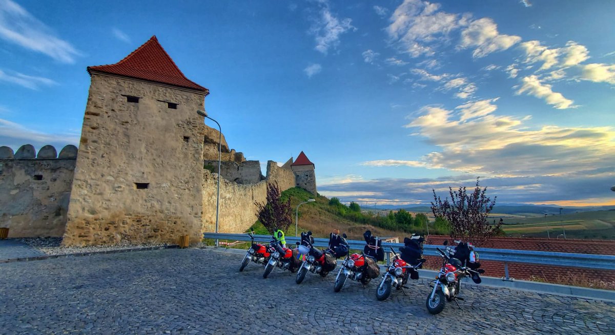 TheAdventurists's tweet photo. Monkey bikes. So cool even the buildings have to have a cheeky little look. #MonkeyRunRomania https://t.co/pBmyUlVpgX