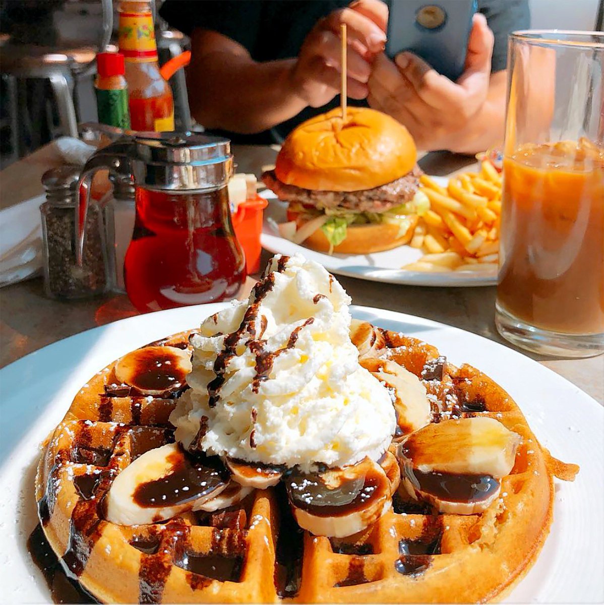 MTOCafe's tweet photo. Where else can you order decadent waffles and juicy burgers? 

📸 @socaltovegasfoodie #EatWhatYouWant https://t.co/ZnDt5p7a5C