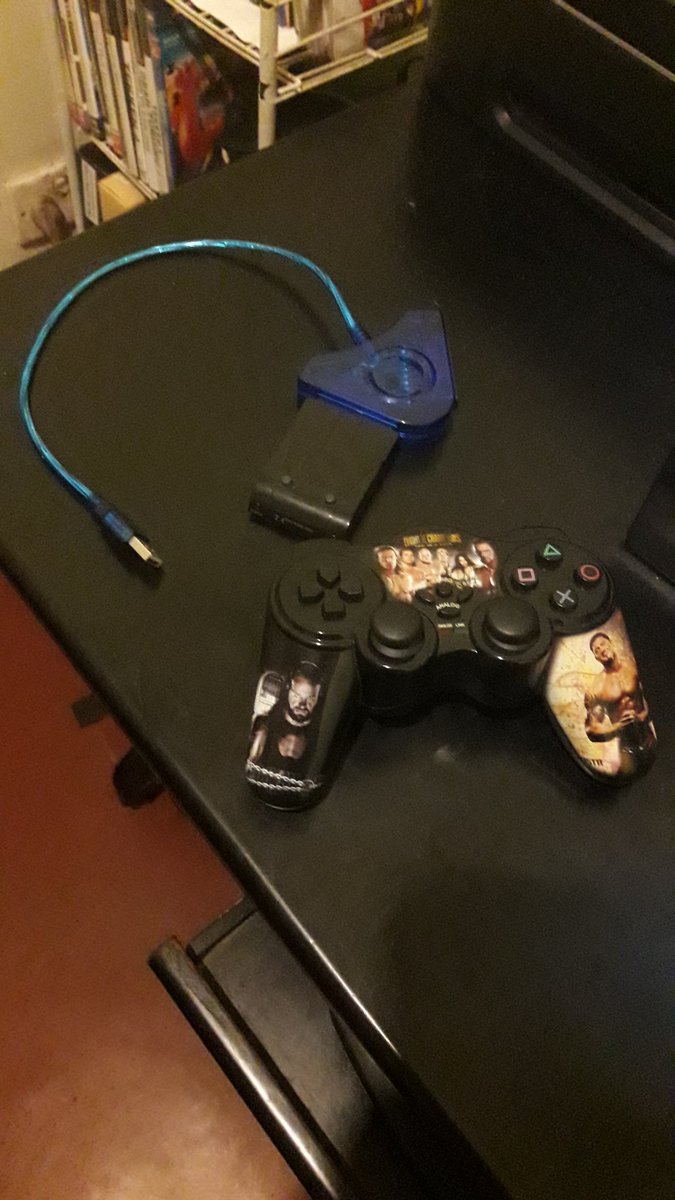 The thrifty luck I've been having on this little project continues  . I stumbled on this "PlayStation2 to USB adaptor" ($2) online and bought it. Now I can use the trusty ps2 wireless game pad that I already had with my batocera rig instead of buying a new controller for it.