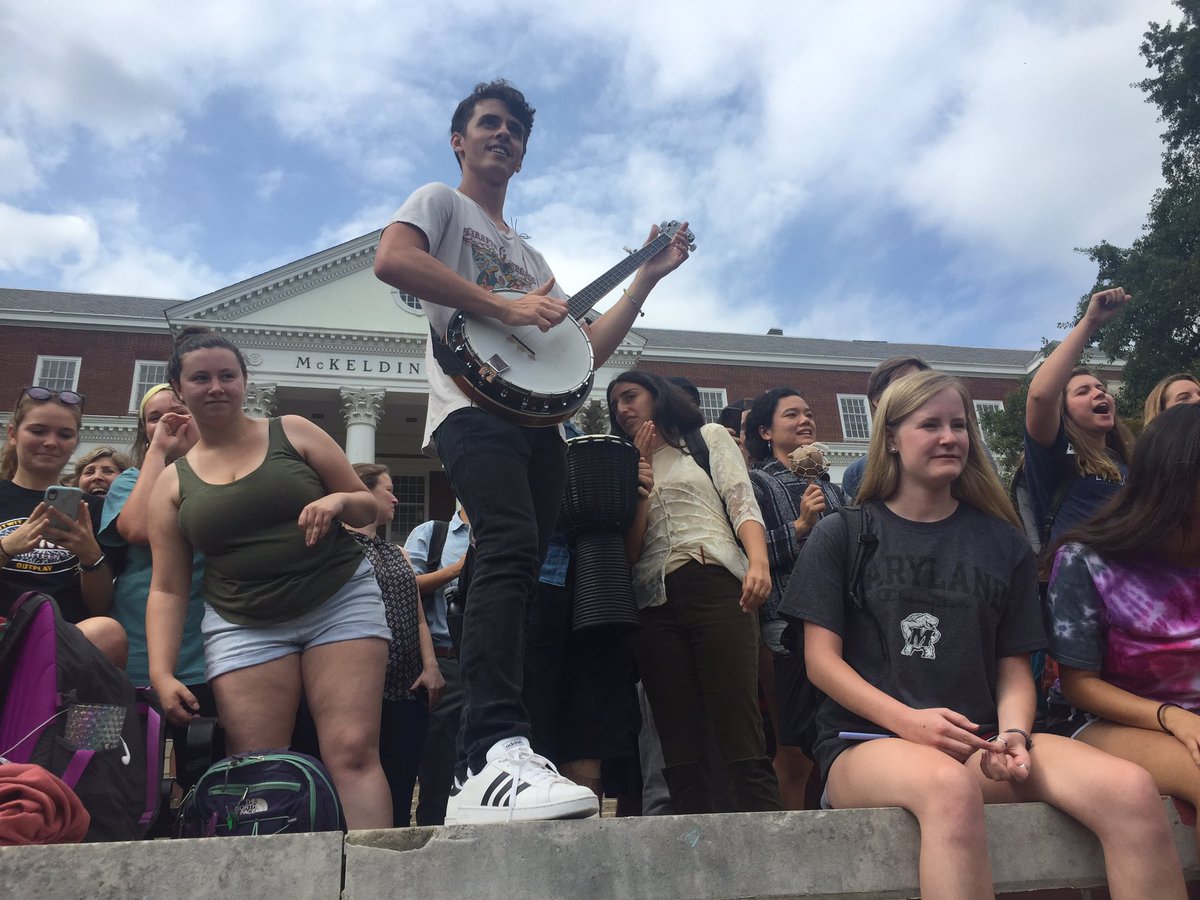 victoria_ebner's tweet photo. Right now on McKeldin Mall: Hundreds of students surround Christian protestors to dance, kiss and make their voices heard @thedbk #umd https://t.co/LxAJQ7lUrU