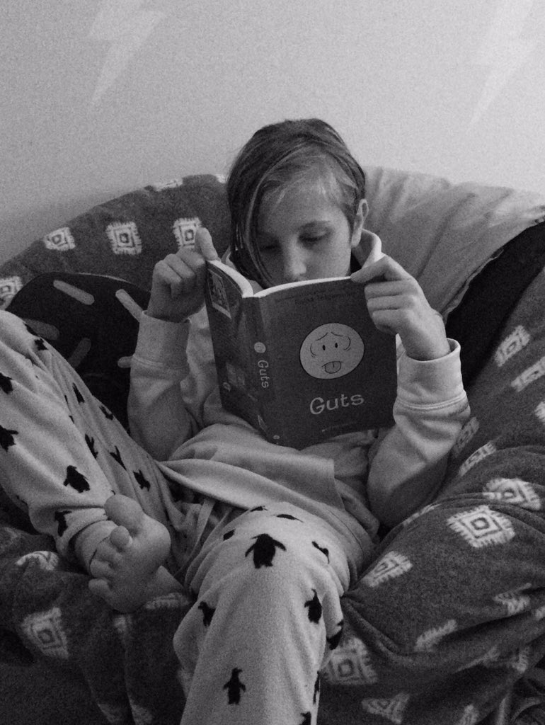 Comfy clothes, favorite reading spot, &amp; the UPS man just delivered the newest <a href="/goraina/">Raina Telgemeier</a> book! Thank you - the topic of "Guts" is on point for my kiddo! I won't see her until it's done! <a href="/MsOsborneLib/">Chrissy Osborne</a>