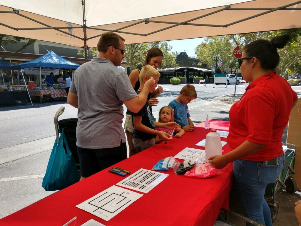 ScienceInOurCo1's tweet photo. August: Science in Our Community at Farmer's Market doing Cheek Cell DNA and Ozobot activities. #StanState #StanSTEMAmbassador #Science #STEM #Stanservicelearning https://t.co/5Nppl7Zw19