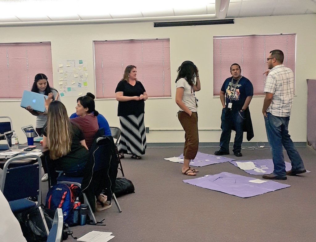 OEpisd's tweet photo. Multiple ways of learning captured in one pic: LASW (looking at student work protocol), peer to peer collaboration, and active listening. Deeper Learning in action. #TTP2 #iamepisd High-five to these teachers for demonstrating agency! https://t.co/wO7v5i16l0